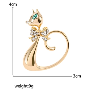 Minimalist gold cat brooch with sparkling rhinestones and green gem eyes 4cm x 3cm