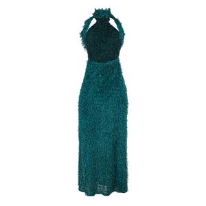 Detail of dark green halter neck dress showing textured fringe material and slim fit design