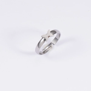 Detailed view of silver butterfly cutout open ring in polished stainless steel