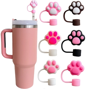 Pink tumbler set showing six colorful cat paw silicone straw covers for dust protection