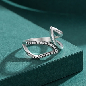 Modern 925 sterling silver open ring with hollow leaf design and pavé cubic zirconia