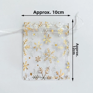Detail showing 10x12cm white organza gift bag with gold and silver snowflake patterns
