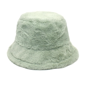 Detail shot of plush faux mink fur bucket hat in light mint green with soft texture