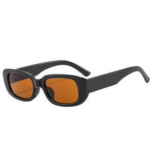 Retro matte square sunglasses with orange tinted lenses in a 45-degree angle view