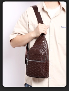 Detail of dark brown woven PU leather men's chest bag with a silver metal zipper