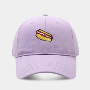 Detail of lavender baseball cap featuring hot dog embroidery and cotton twill texture