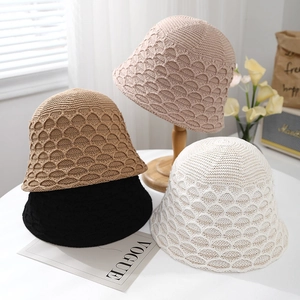 Hollow knit bucket hats for women in beige, brown, black, and white colors