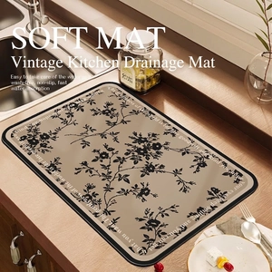 Absorbent kitchen draining mat with vintage leaf pattern and non-slip rubber backing