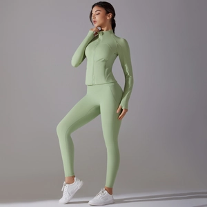 Slim fit light green yoga set with long sleeve zip jacket and high waist leggings