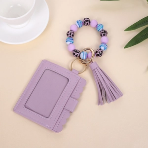 Purple floral silicone bead wristlet keychain with PU leather card holder and tassel