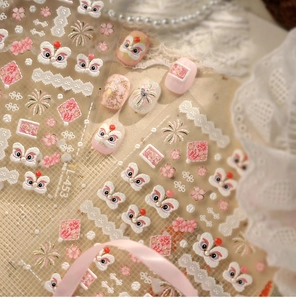 Macro detail of TL-453 3D embossed nail stickers with pink lion dance and floral motifs