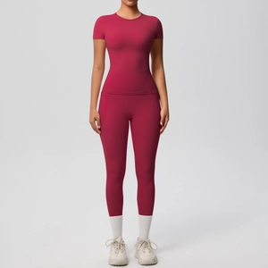 Front view of dark red high-elastic yoga set with slim fit top and high-waist leggings