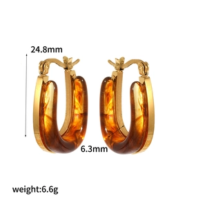 Macro detail showing measurements of amber resin C-shape earrings with 18k gold plating