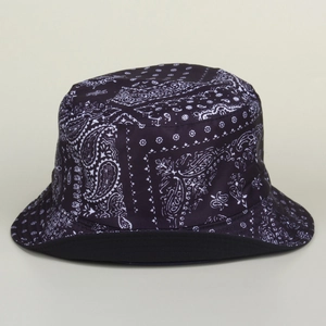Detailed top view of paisley print bucket hat with black and white sun protection brim