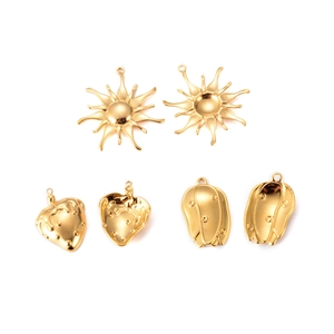 Vintage 18k gold plated stainless steel charms featuring sun, strawberry and geometric designs