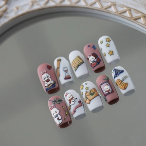 Matte pink and white rabbit-themed nail stickers with fairytale illustrations on mirror