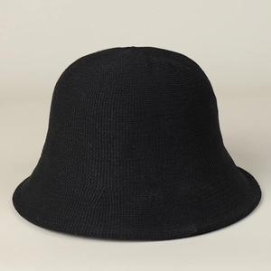 Close-up of the black knitted sun hat showing detailed fine weave and mesh texture