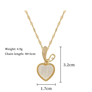 Detailed view of heart pendant necklace with size measurements 3.2cm by 1.7cm in gold finish