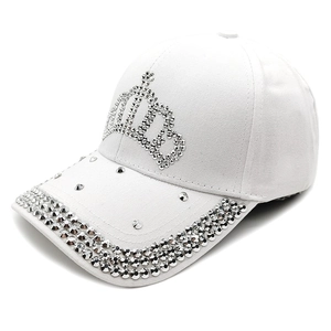 White baseball cap with silver rhinestone crown pattern and studded brim detail
