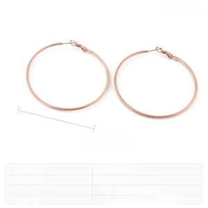 Macro detail of large rose gold hoop earrings showing spiral texture and 60mm diameter size