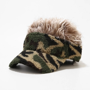 Detail of camouflage baseball cap featuring realistic brown wig hair on the crown