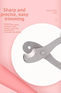 Detailed close-up of stainless steel pet nail clipper blades with a safe curved cutting edge