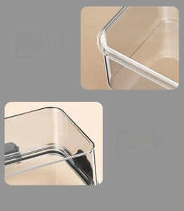 Detail of rounded safety corners and non-slip elevated base on transparent lunch box