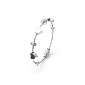 Detailed side view of silver cable wire bracelet with heart, moon, and pavé ring charms