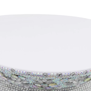 Macro view of detailed rhinestone embellishments on a white bridal captain hat brim