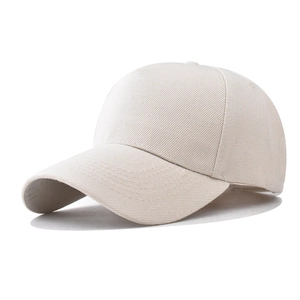 Detail of cream polyester baseball cap showing reinforced stitching and breathable eyelets