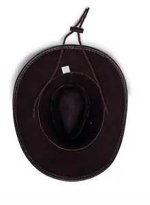 Detail view of brown cowboy hat interior with textured brim and adjustable wind cord