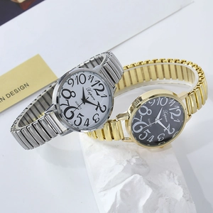 Women's quartz watch with large numerals and elastic band in silver and gold tones