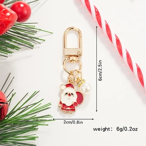 Detail showing Santa Claus pendant with red enamel, white pearl and dimensions