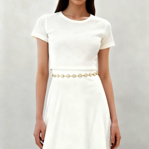 Fashionable gold metal waist chain featuring exquisite flower links for beach and summer wear