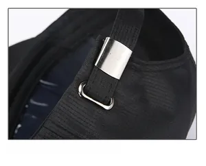 Detail of black baseball cap with adjustable silver metal slider buckle and woven texture