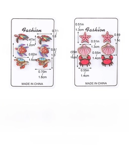 Detailed view of colorful wooden sea animal stud earrings with size and weight specs