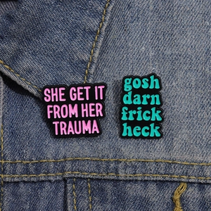 Stylish enamel letter brooches on denim jacket featuring modern quote designs