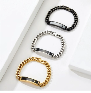 Three Cuban link bracelets in gold, silver and black with carbon fiber inlays
