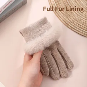 Thick warm winter gloves for women with faux fur cuffs and touchscreen fingertips