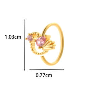 Detail view of a gold nose stud featuring pink zircon stones and precise dimensions