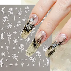 Retro gold stamping nail stickers with white lily heart and celestial moon star designs
