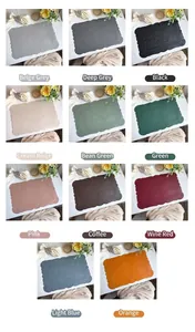 Collage of eleven colored faux leather placemats with baroque embossed floral textures