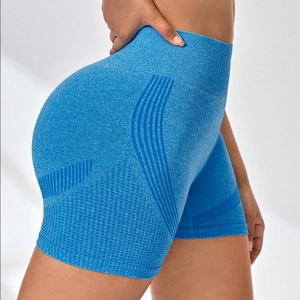 High-waisted seamless scrunch butt yoga shorts in light blue with marl knit texture