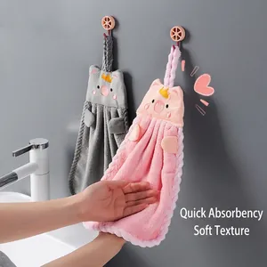 Absorbent coral velvet hanging hand towels with cute pig designs in pink and gray