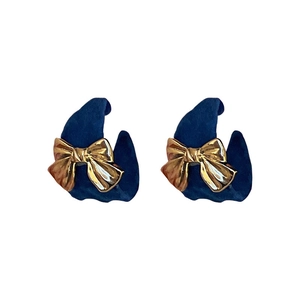French vintage style dark blue velvet earrings with golden bow accents in a heart shape