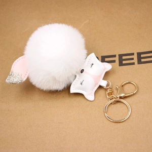 White faux fur ball keychain with pink fox leather pendant and gold sequins