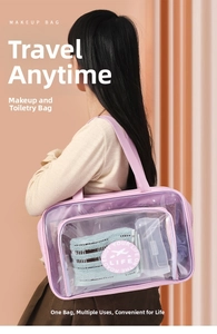 Rear view of a model wearing the pink purple dry-wet separate waterproof PVC toiletry bag