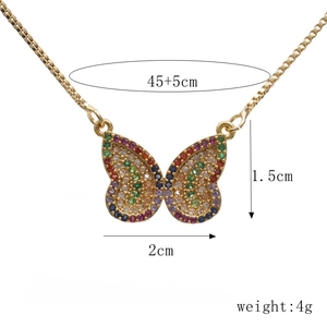 Detailed view of gold butterfly necklace with colored gems showing exact dimensions and weight