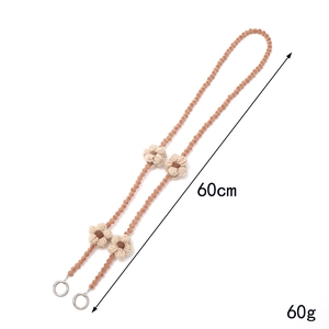 Handmade 60cm beaded phone strap featuring beige plush flowers and silver clasp