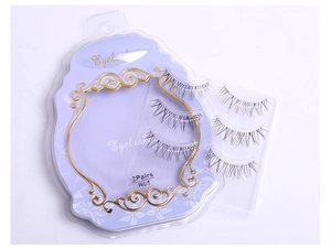 Detail view of 3 pairs of natural false eyelashes with clear bands and tapered ends